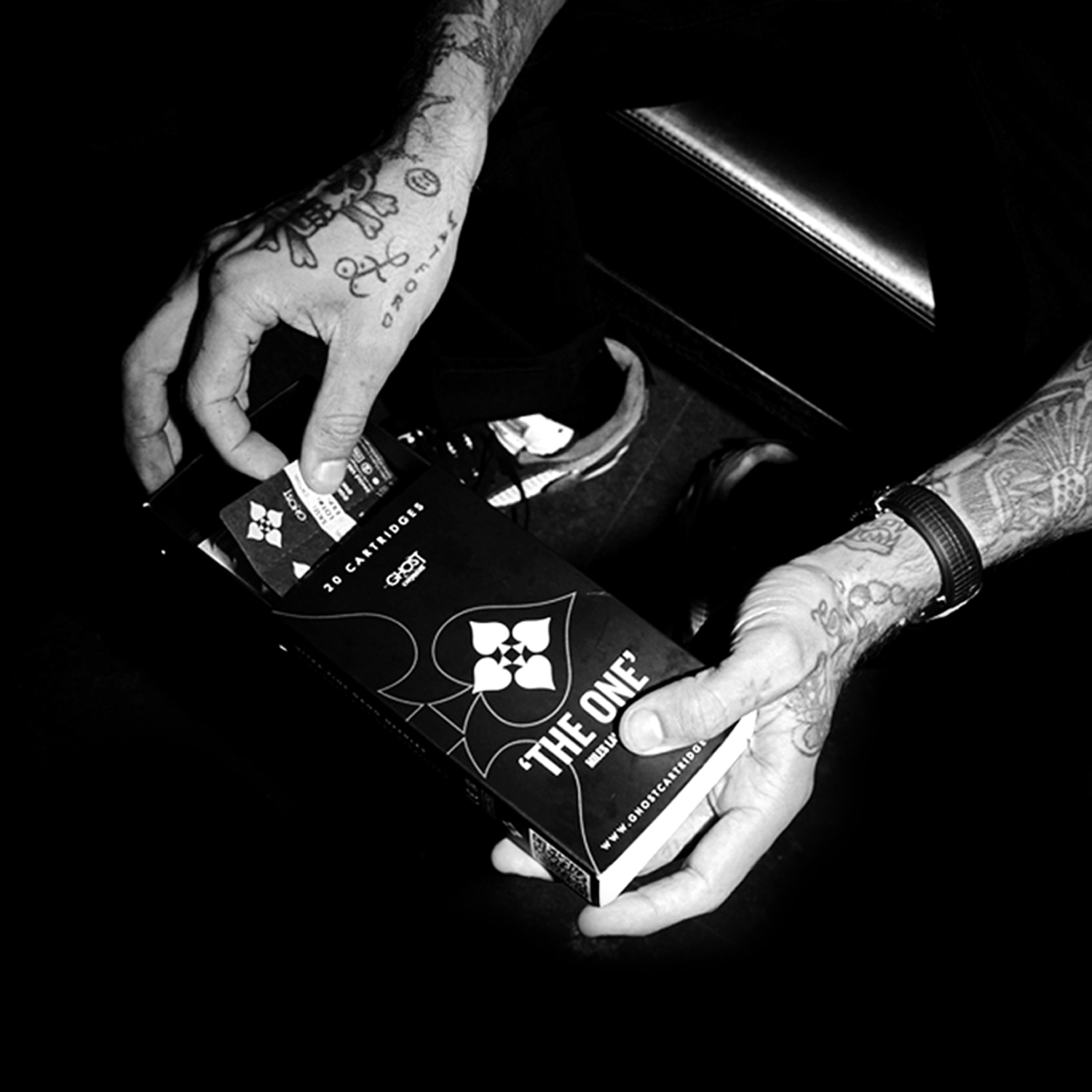 Miles Langford skull and crossbones hand tattoo