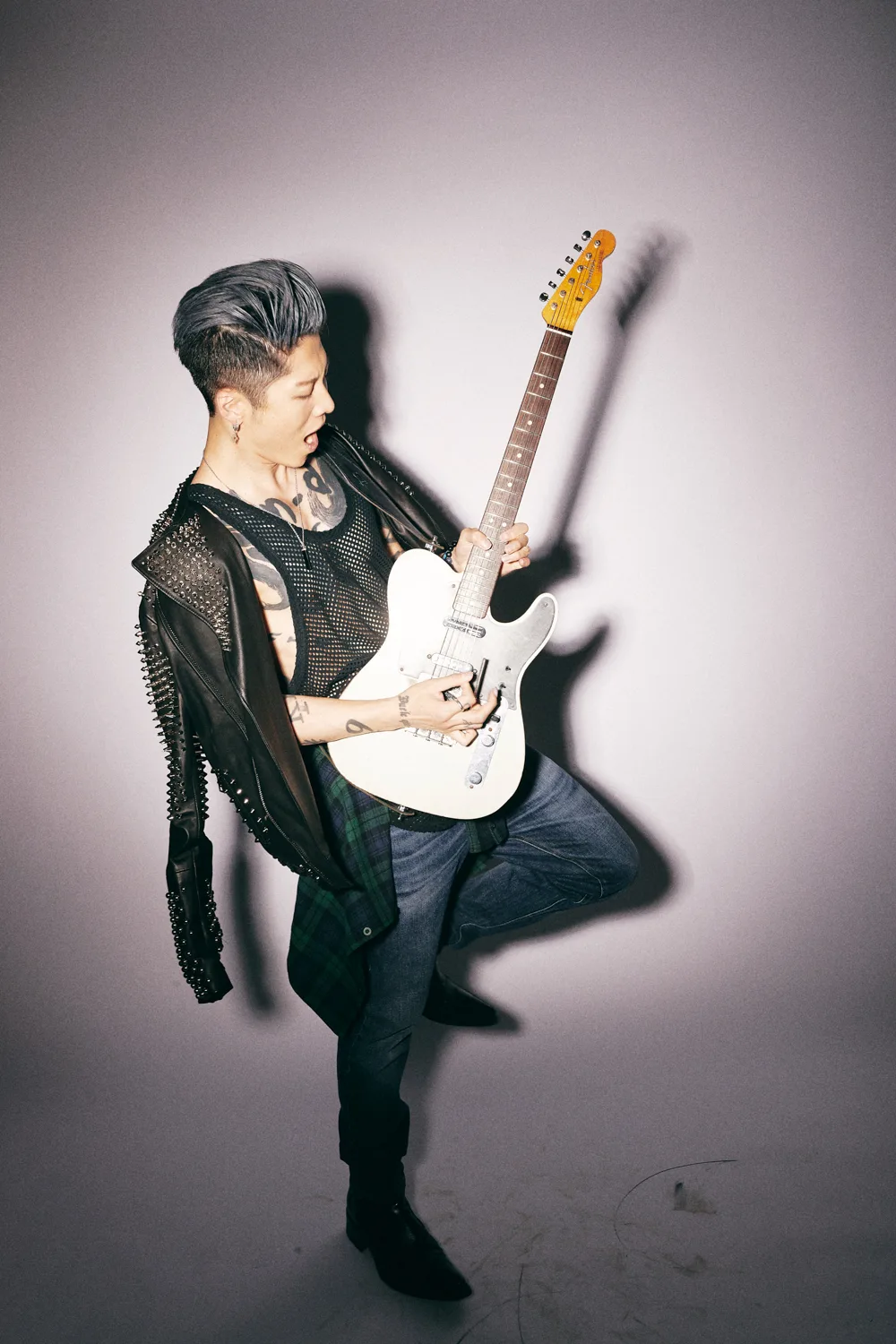 Miyavi chest kanji and guitar tattoos