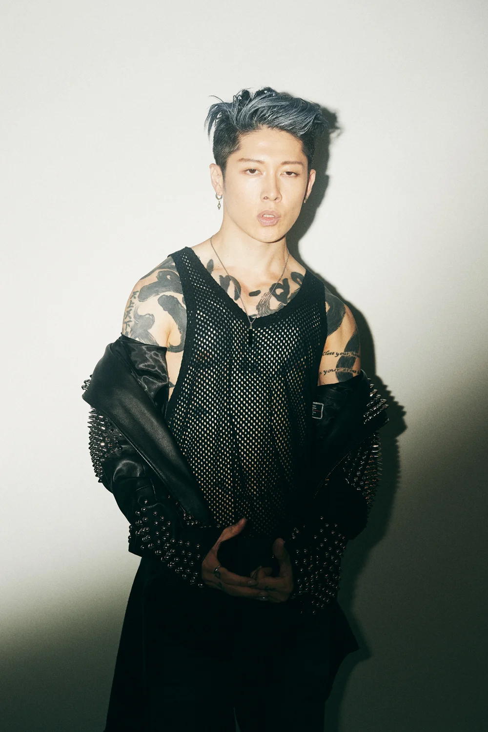 Miyavi brushwork chest and shoulder tattoos