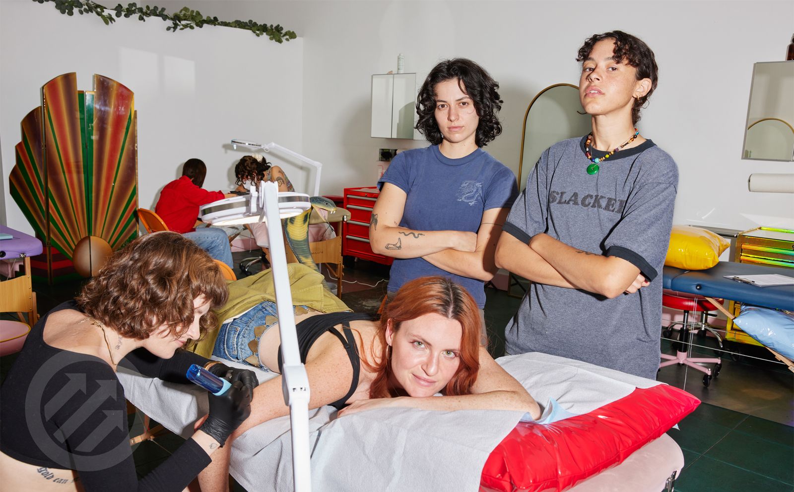 MUNA MUNA in the tattoo shop with the members and tattoo station visible MUNA tattoos: MUNA in the tattoo shop with the members and tattoo station visible