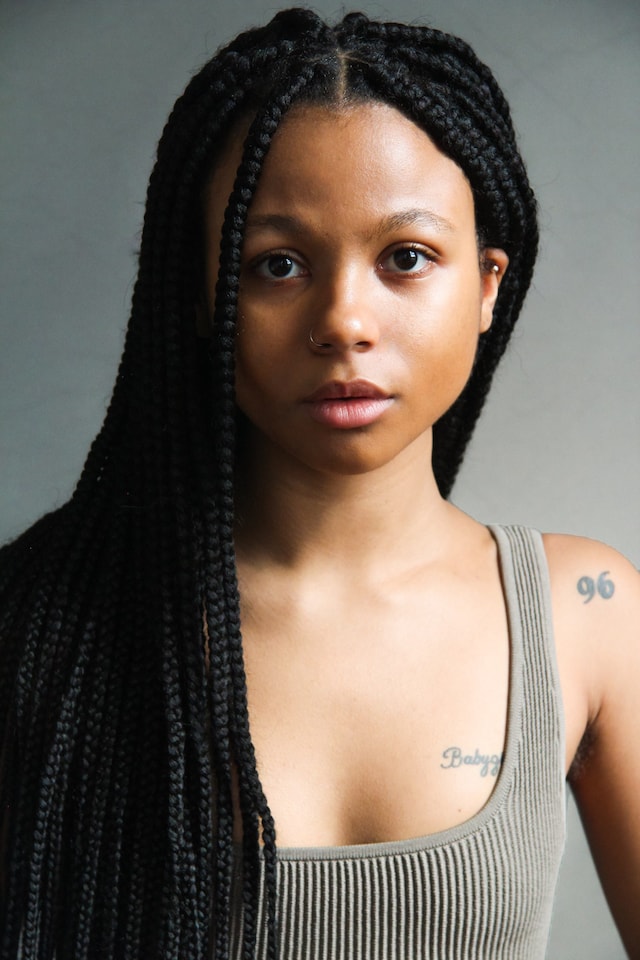 Myha'la tattoos: Distinct Dazed portrait showing the shoulder number and chest lettering clearly.
