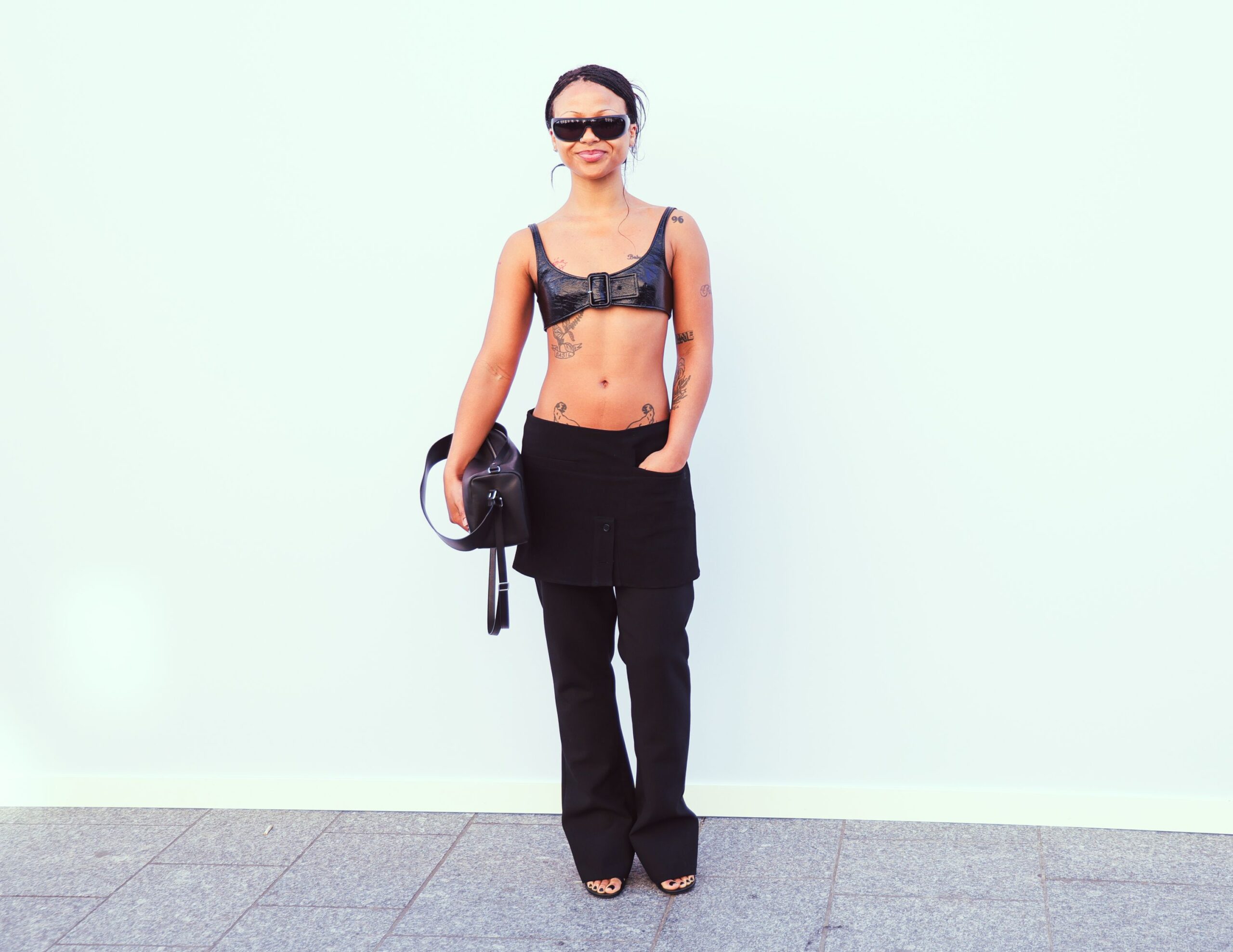 Myha'la tattoos: Genuine matching tattoo photograph showing both lower-abdomen panthers.