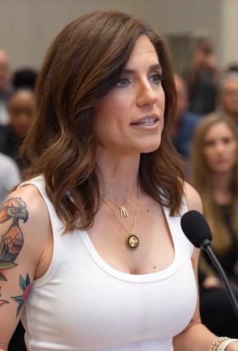 Nancy Mace tattoos: Close view of the bird and flower motifs.