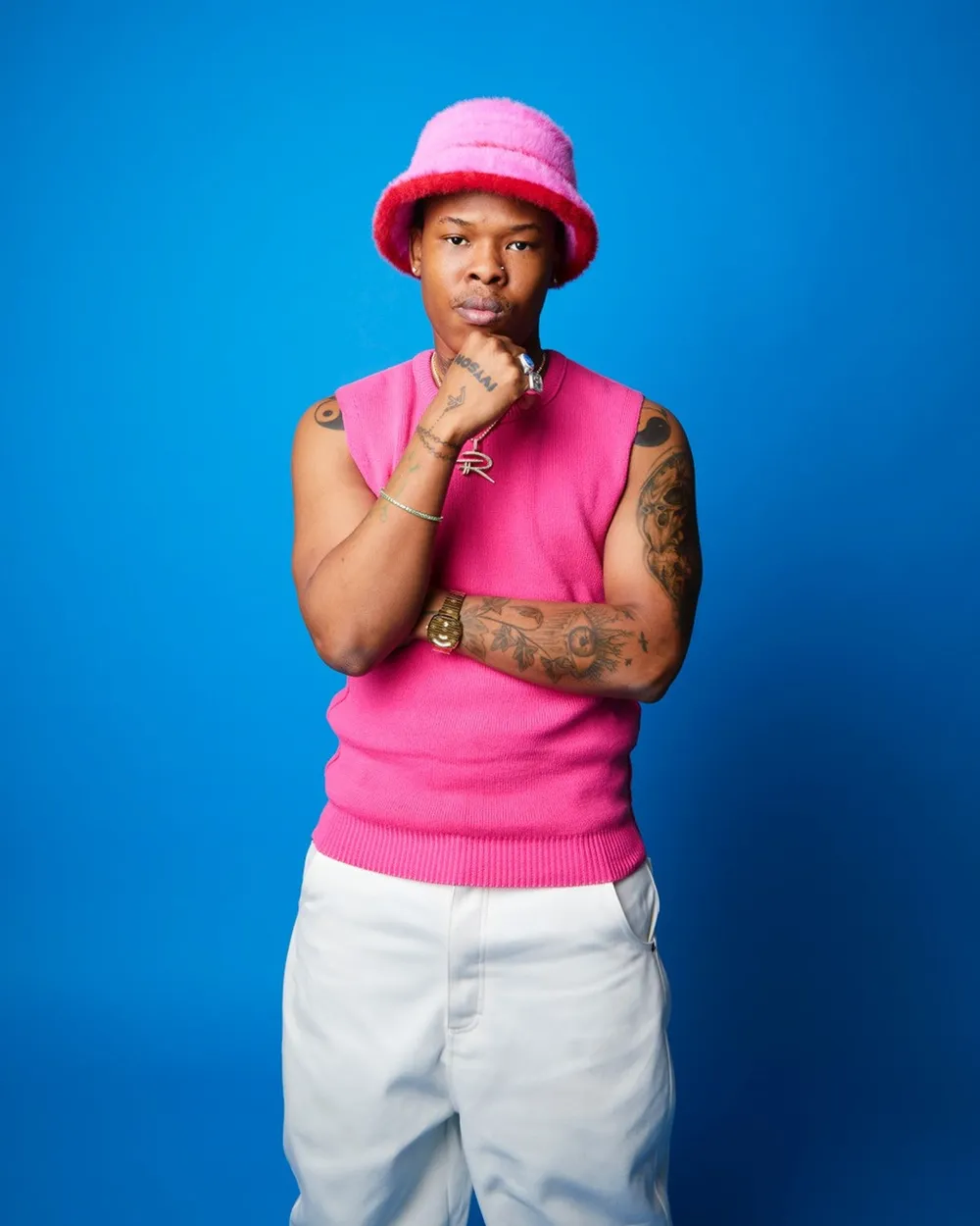 Nasty C tattoos: full arm and hand tattoos in a bright studio fashion portrait