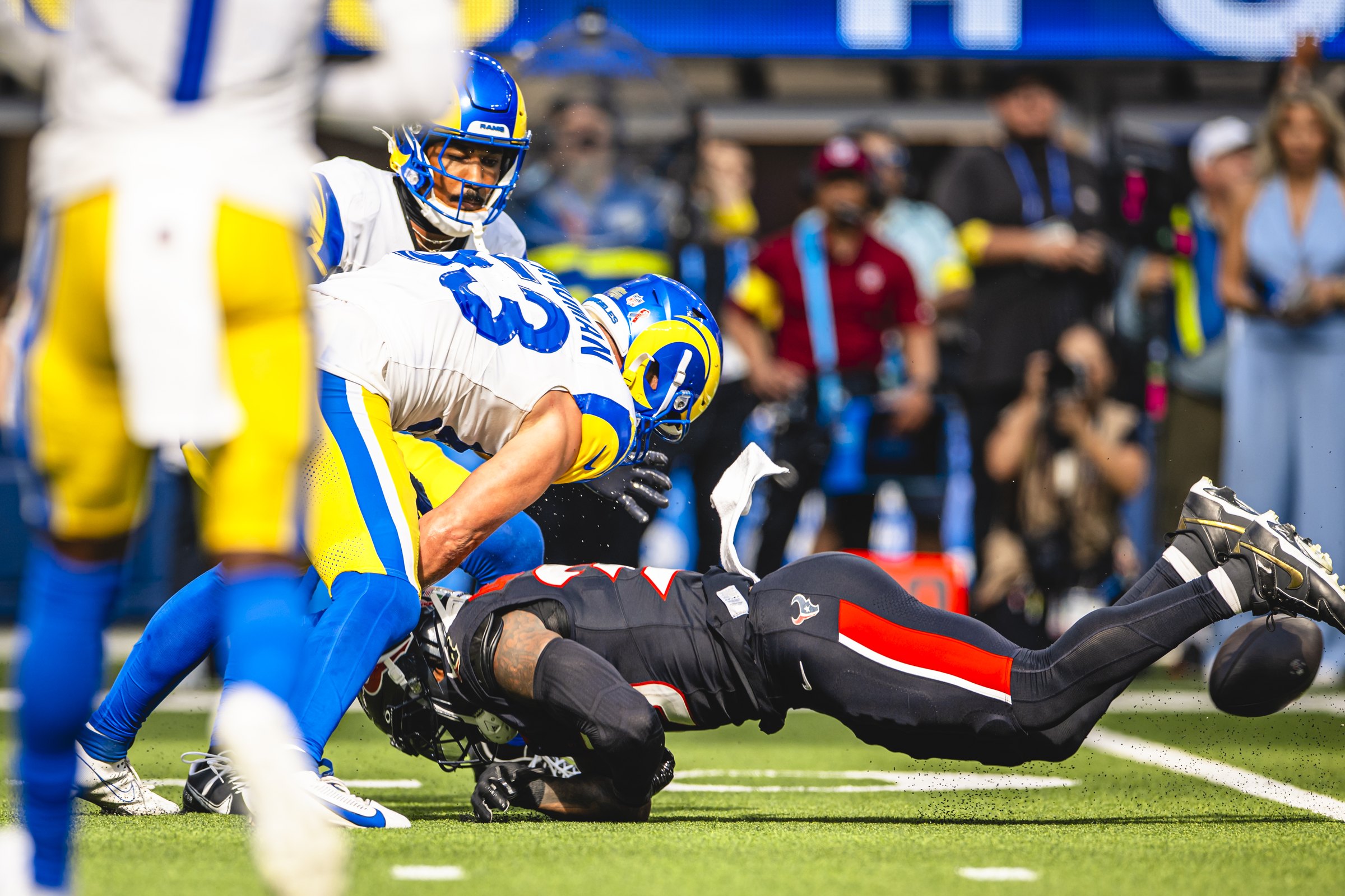 Nate Landman tattooed arm in Rams photo Nate Landman tattoos: separate high-resolution action photograph confirming the same tattooed arm across Rams coverage