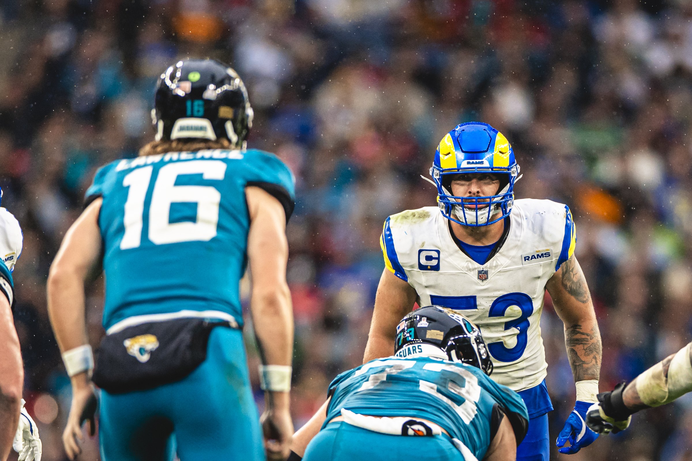 Nate Landman tattooed forearm during a game Nate Landman tattoos: wide game image showing the tattooed forearm and how the designs read during play