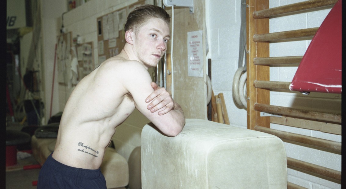 Nile Wilson tattoos: clean training-room photograph showing the rib lettering tattoo