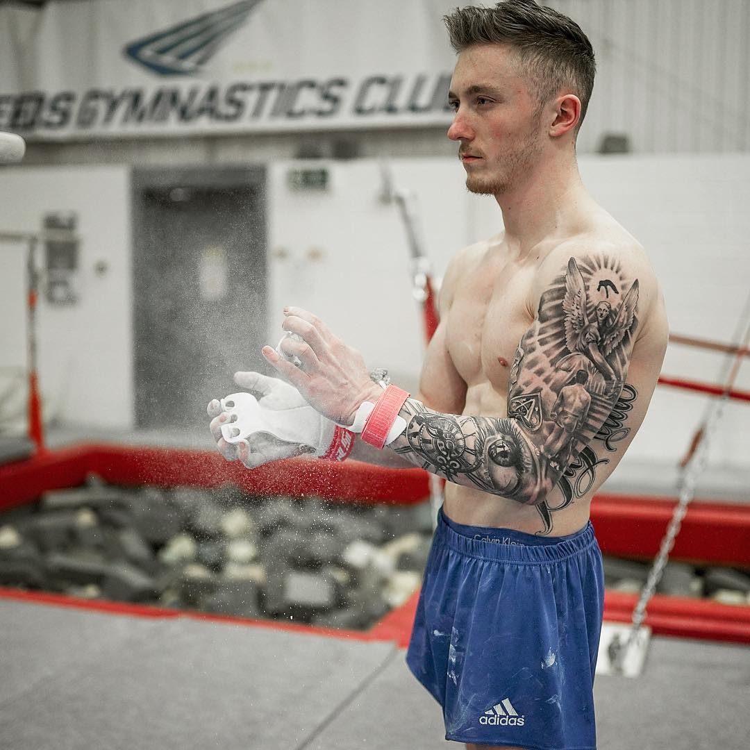 Nile Wilson tattoos: clean gymnastics portrait showing the sleeve and athletic context
