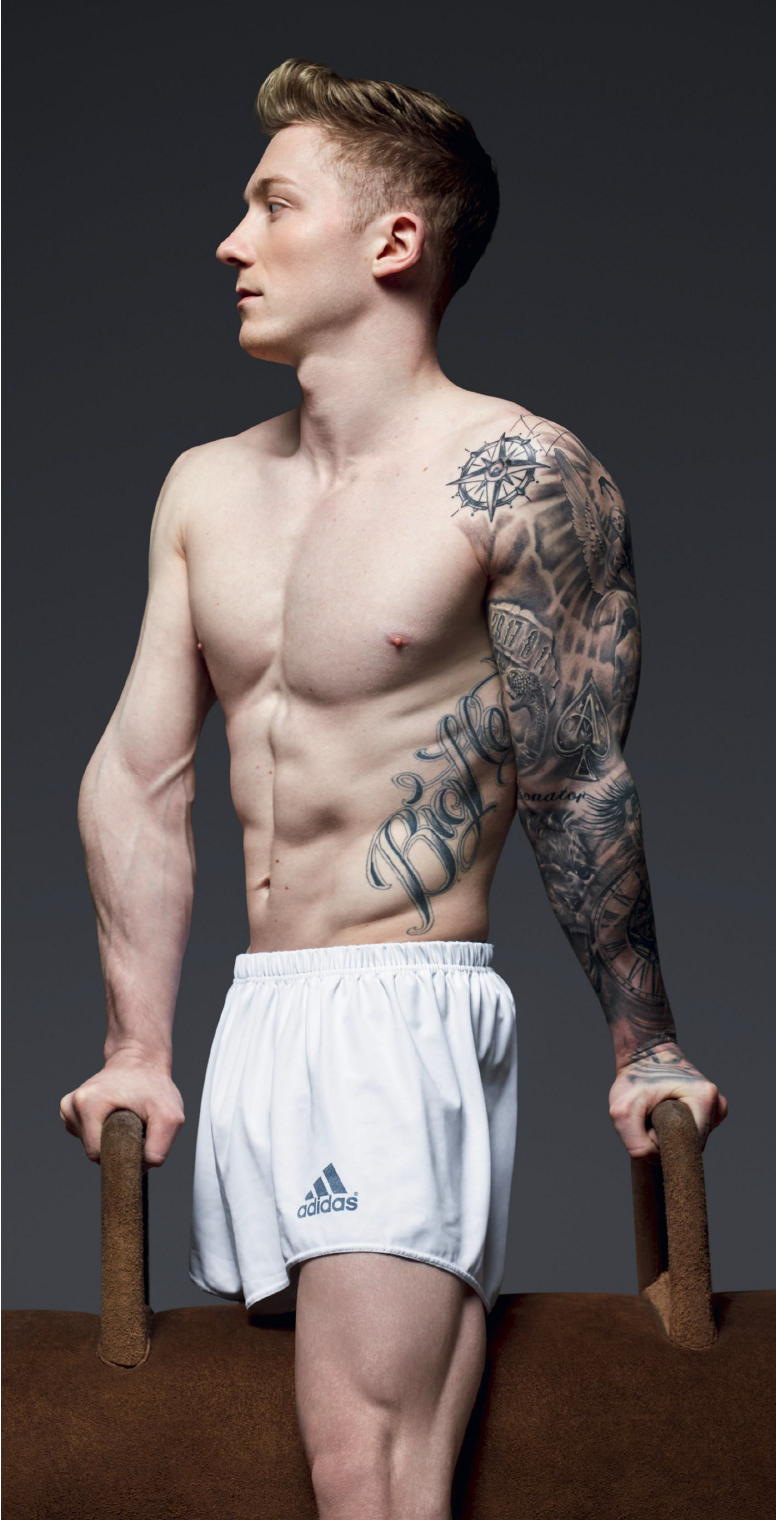 Nile Wilson tattoos: clean studio portrait showing the compass, sleeve and rib lettering