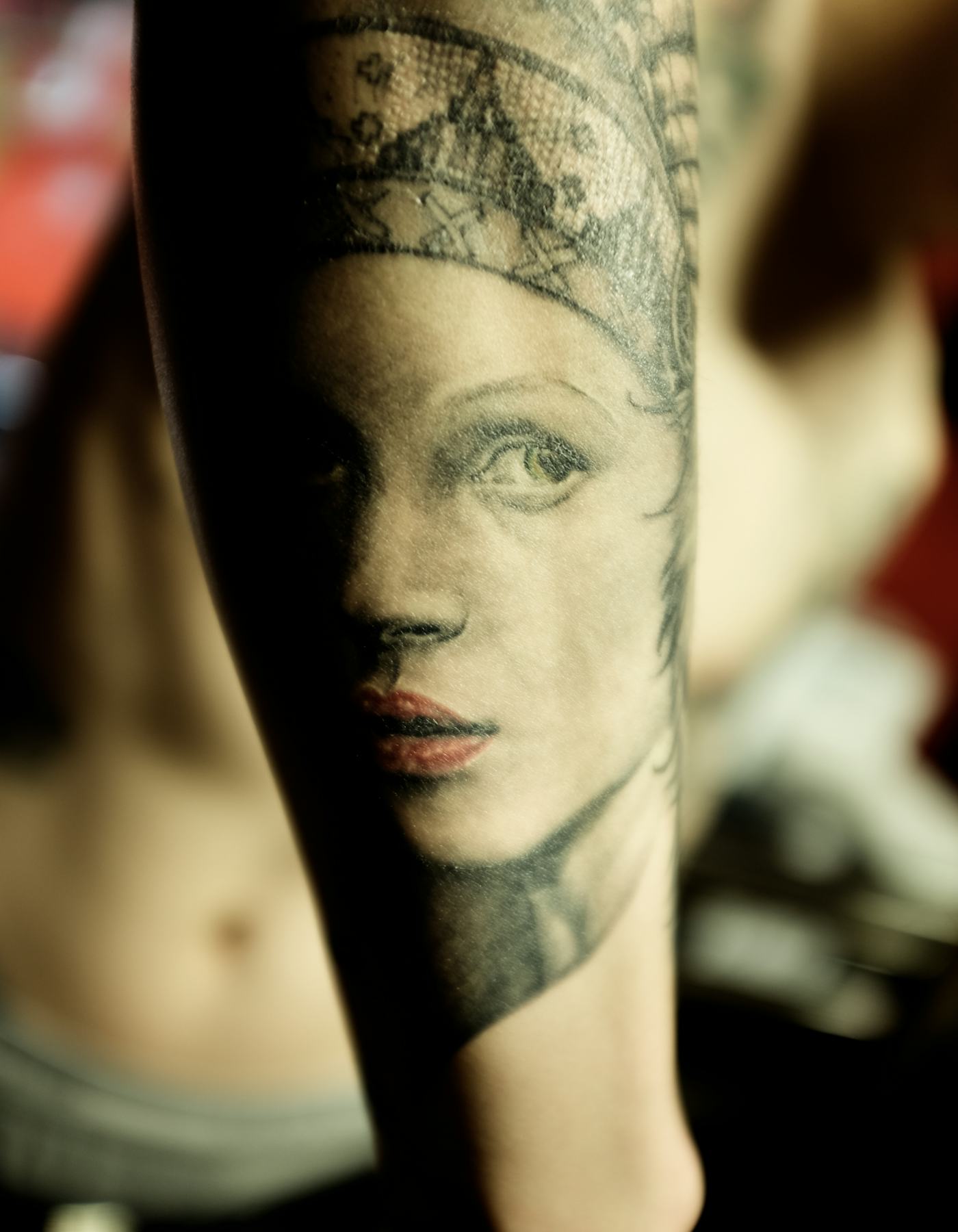 Noma Han tattoos: Kate Moss portrait tattoo close-up