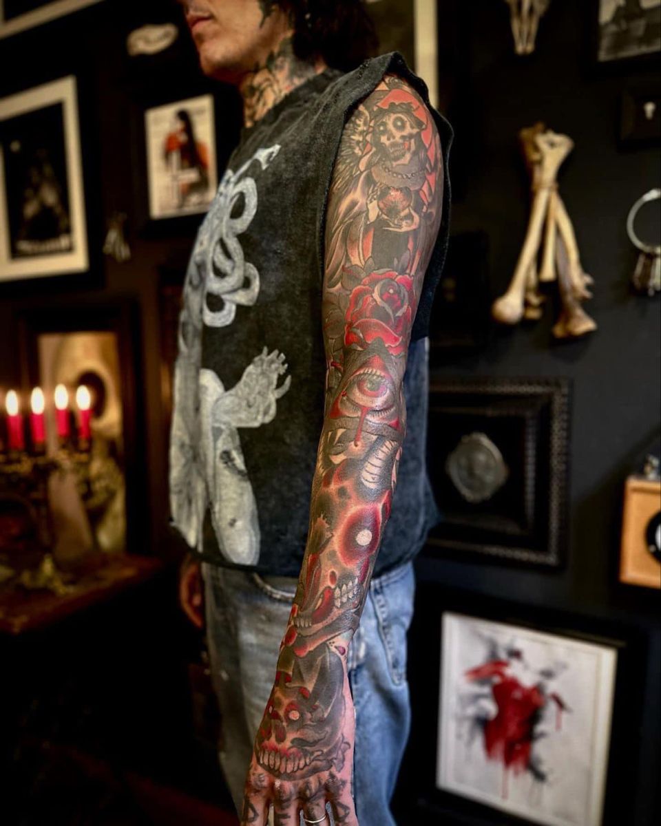 Oli Sykes chest and sleeve tattoos