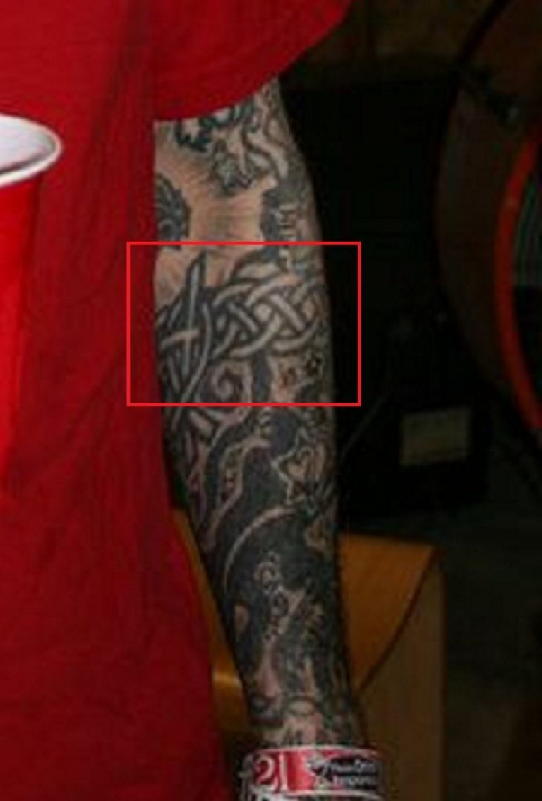 Oliver Peck tattoos: body photograph showing Oliver Peck tattoos relevant to oliver peck's full arm sleeves carry dense traditional imagery