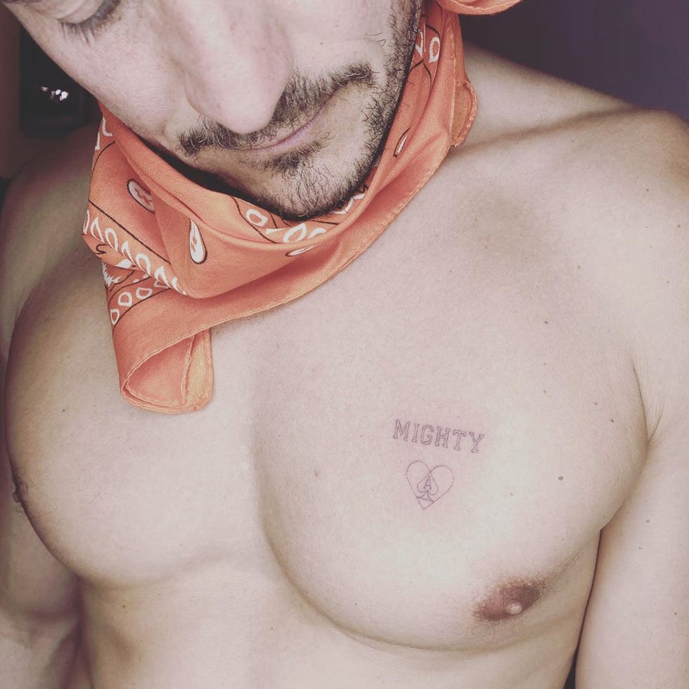 Orlando Bloom tattoos: Mighty name and heart memorial chest tattoo