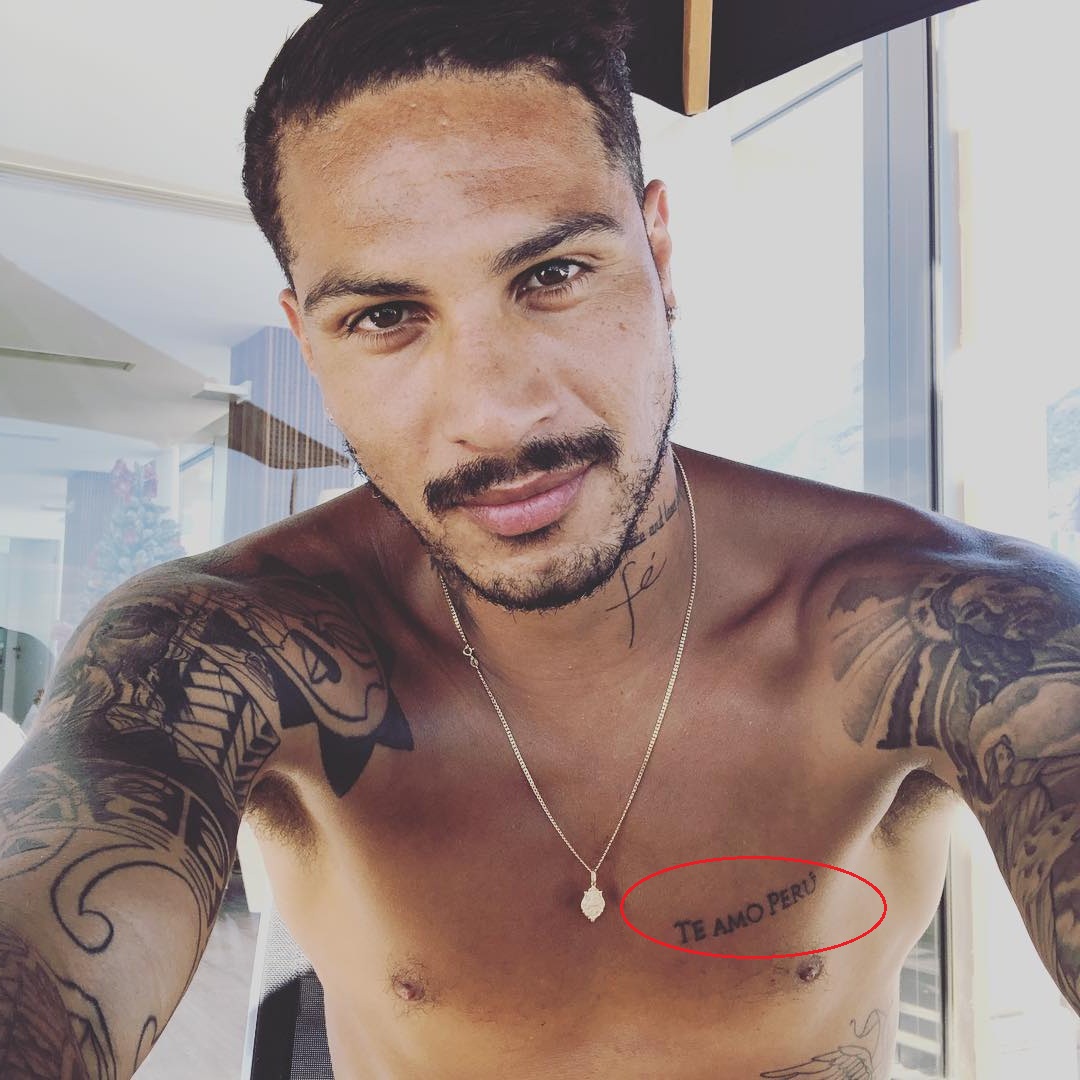Paolo Guerrero tattoos: chest lettering and shoulder contrast