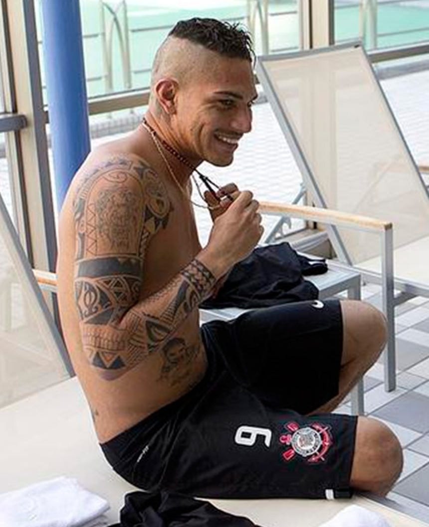 Paolo Guerrero tattoos: tribal and geometric arm coverage