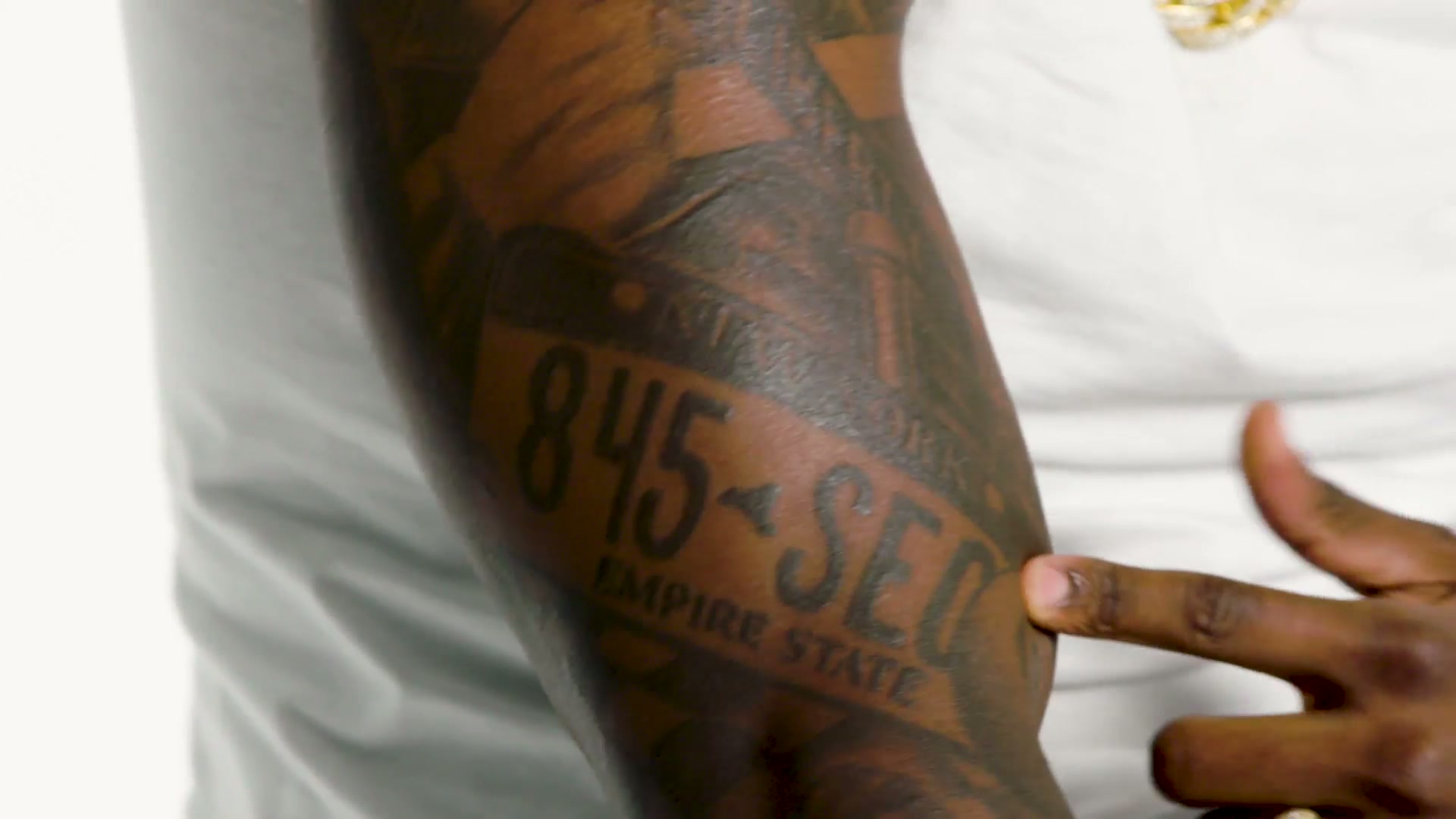The 845 and SEC lettering on the forearm