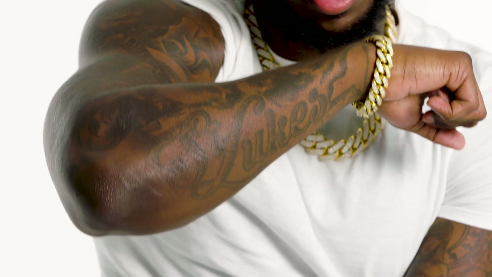 Lettering and portrait work on the forearm