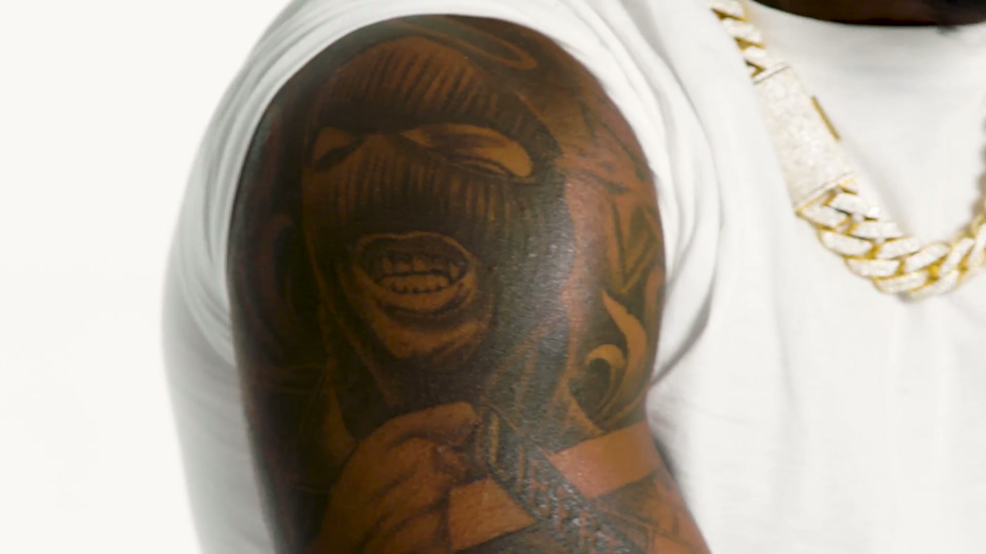 Portrait work across the upper arm