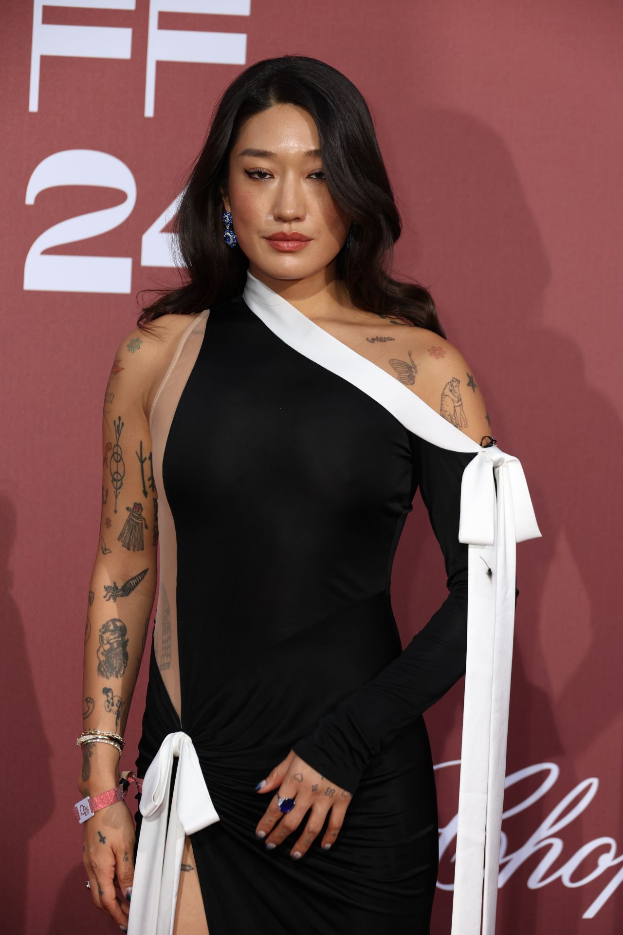 Peggy Gou's shoulder and collarbone tattoos Peggy Gou tattoos: inline