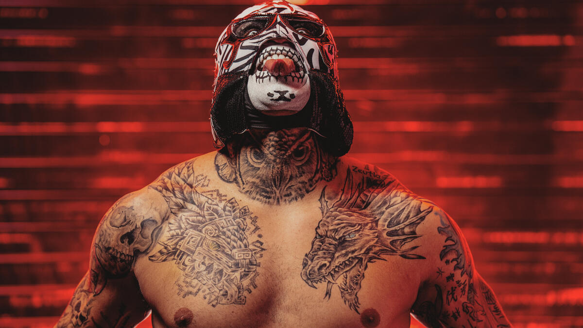 Penta chest and neck skull tattoos