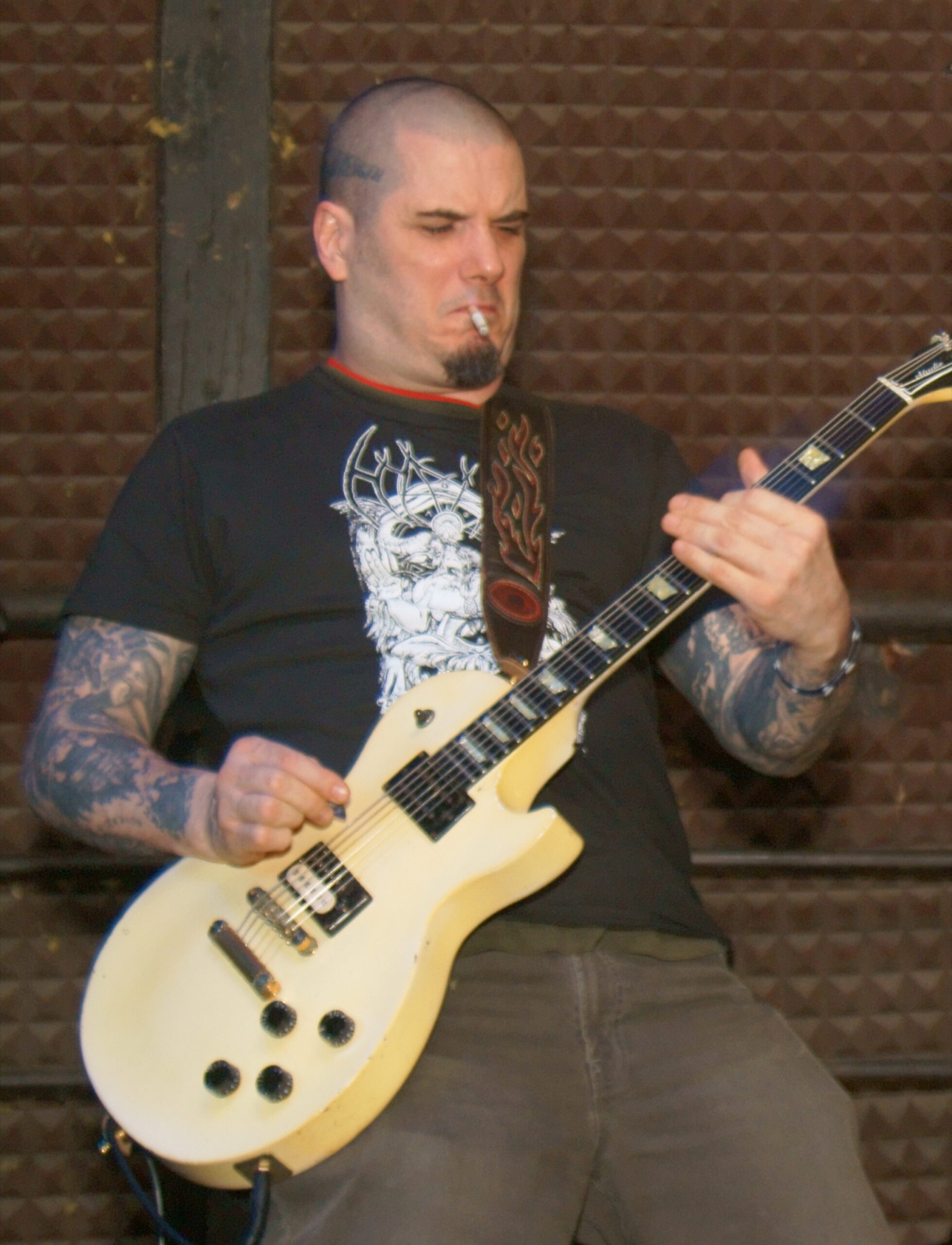 Phil Anselmo tattoo sleeves while playing guitar