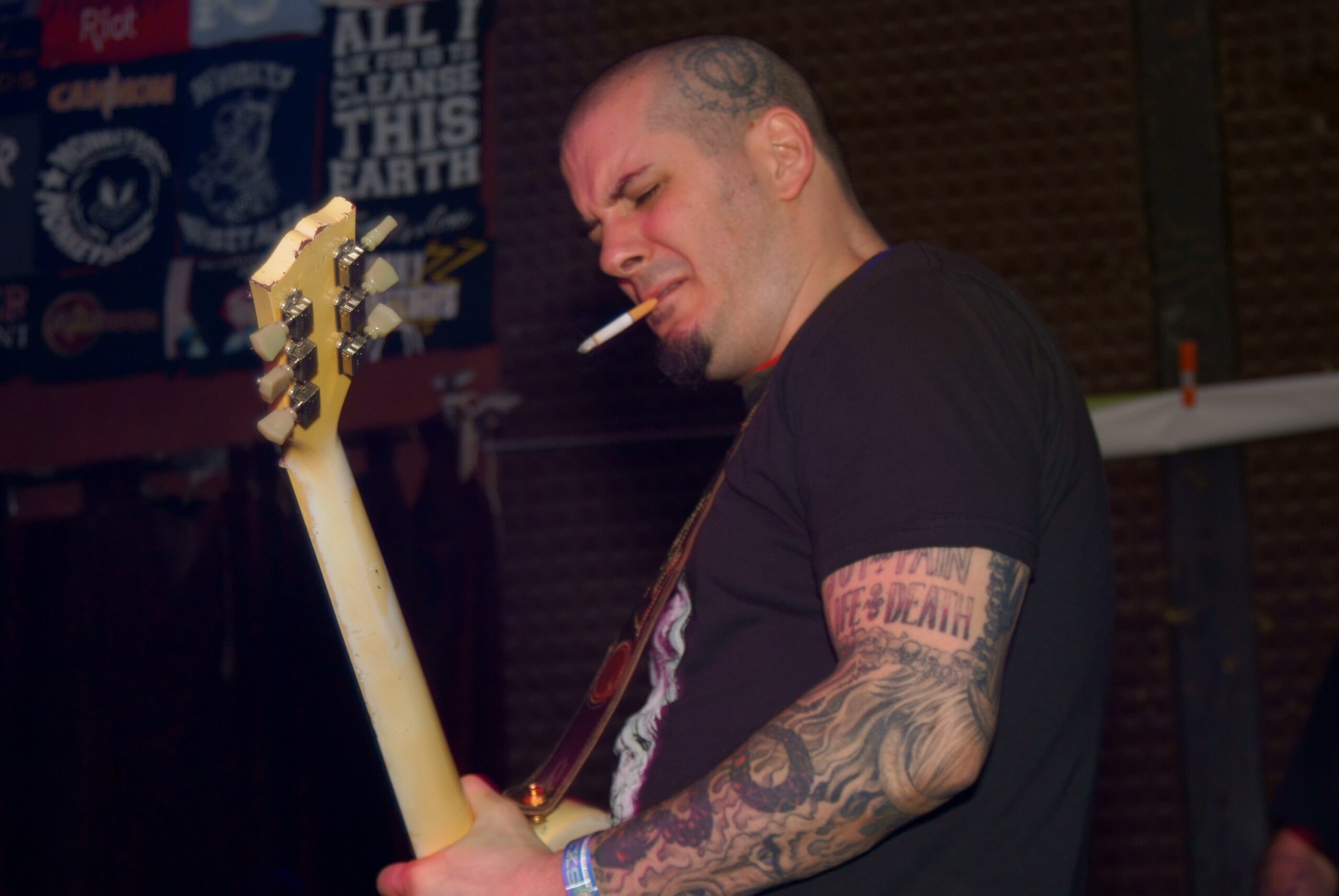 Phil Anselmo tattooed arm and hand tattoos close up