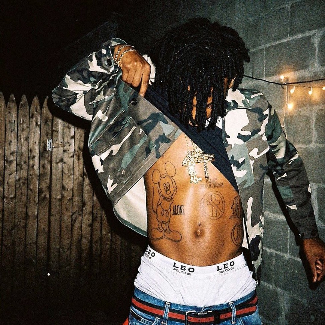Playboi Carti Mickey Mouse and Alone tattoos