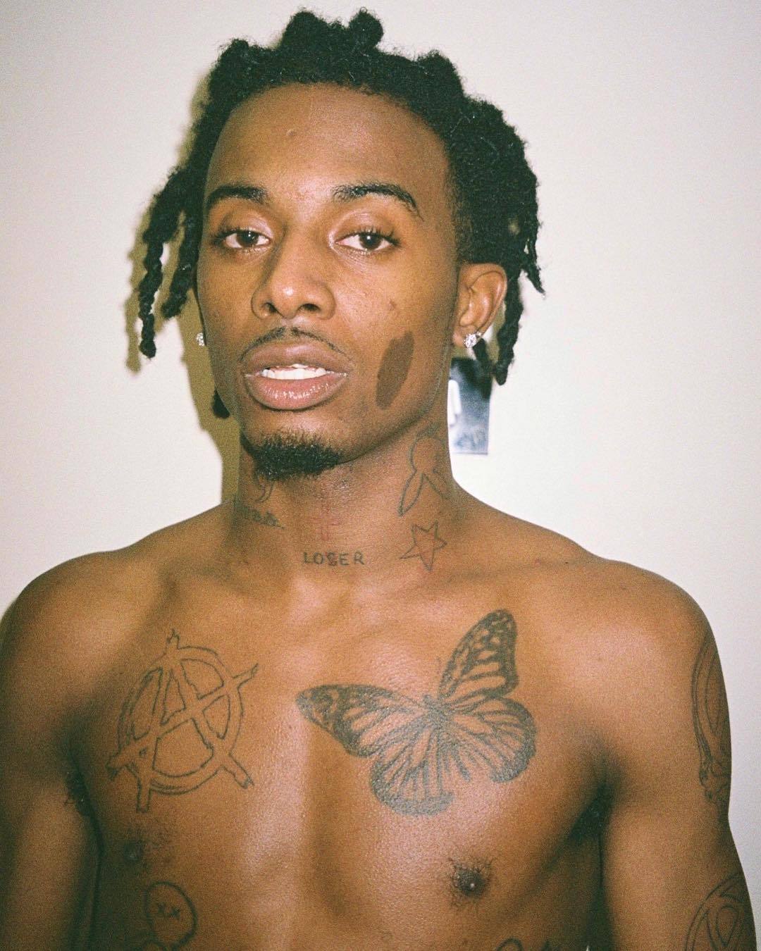 Playboi Carti tattooed torso