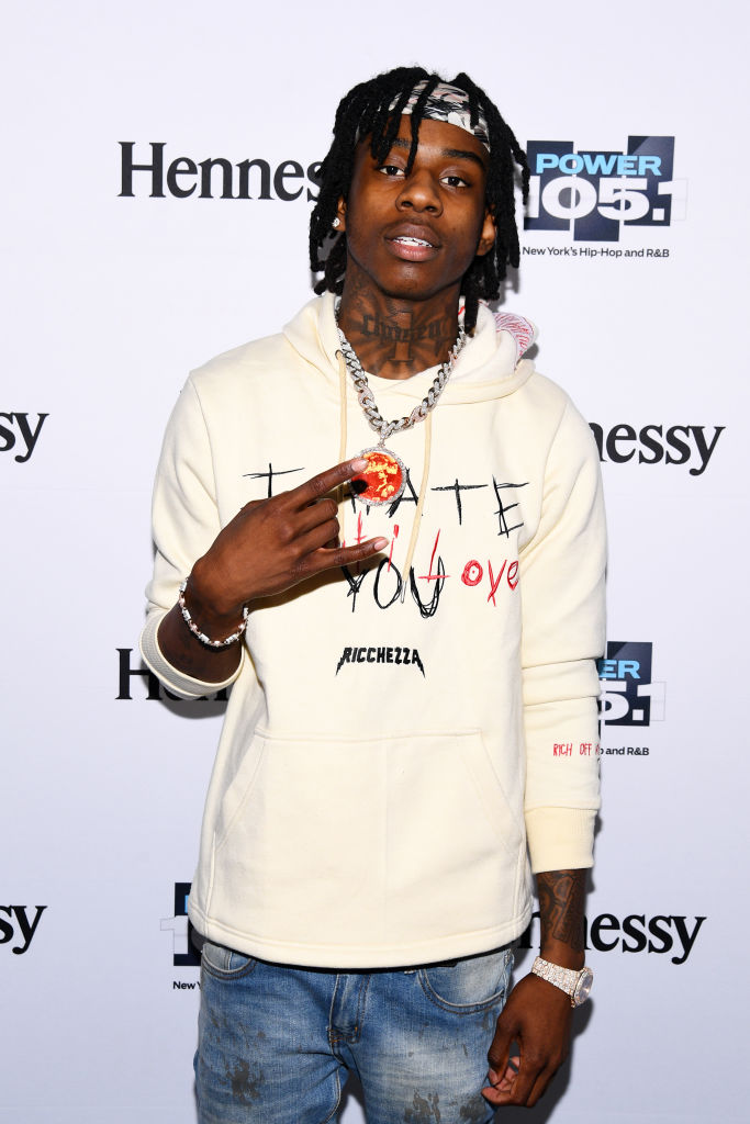 Polo G showing the large tattoo he got as a Juice WRLD tribute