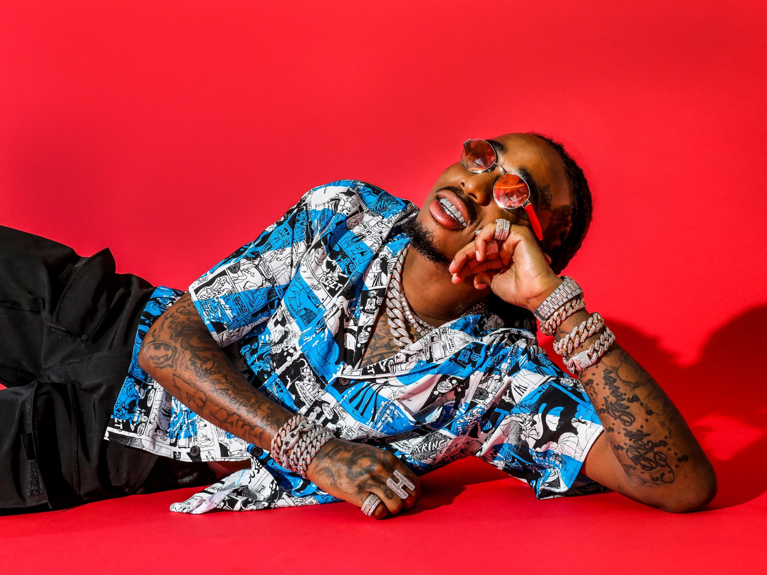 Quavo arm tattoos