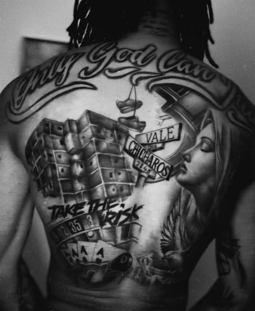 Rafael Leao tattoos: High-resolution back portrait showing the completed full-back tattoo composition