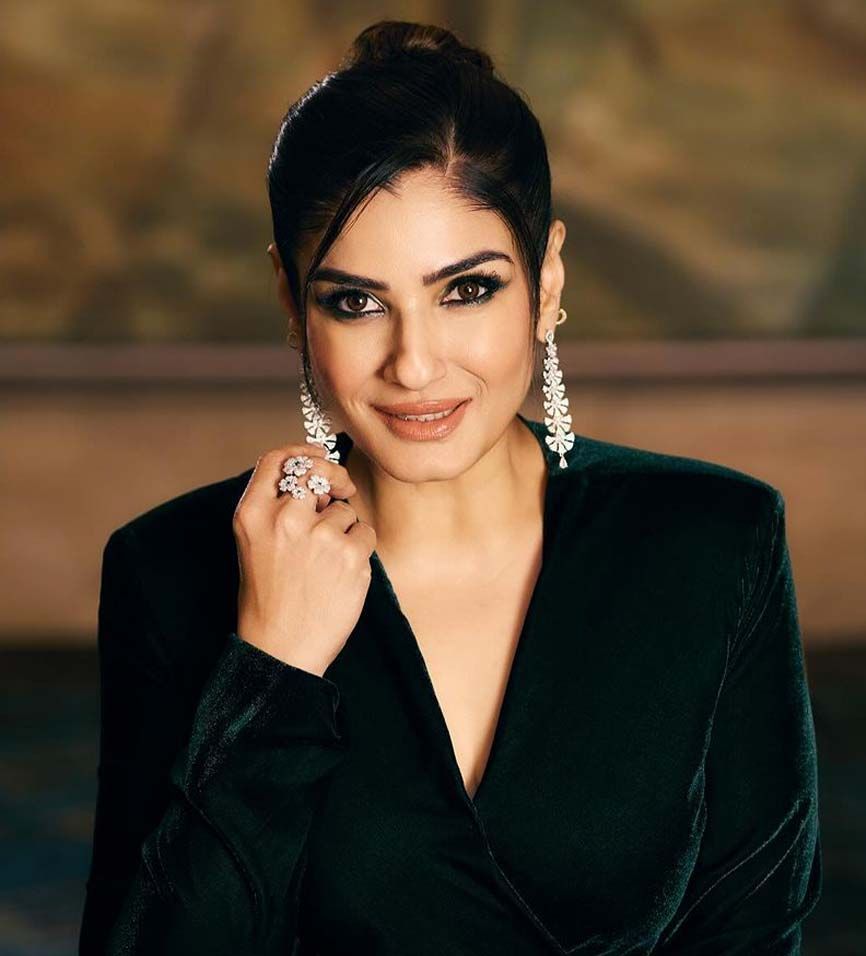 Raveena Tandon in a contextual photograph: Contextual portrait only; not tattoo evidence; not tattoo evidence