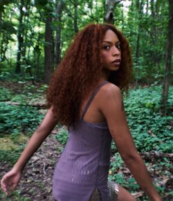 Ravyn Lenae Tattoos: French Proverb, Raven, Aquarius and More