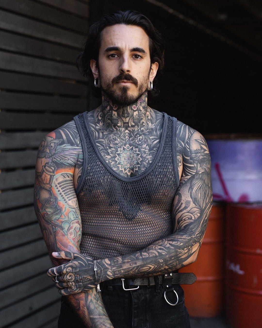 René ZZ hands, arms, and torso tattoos: verified editorial photograph