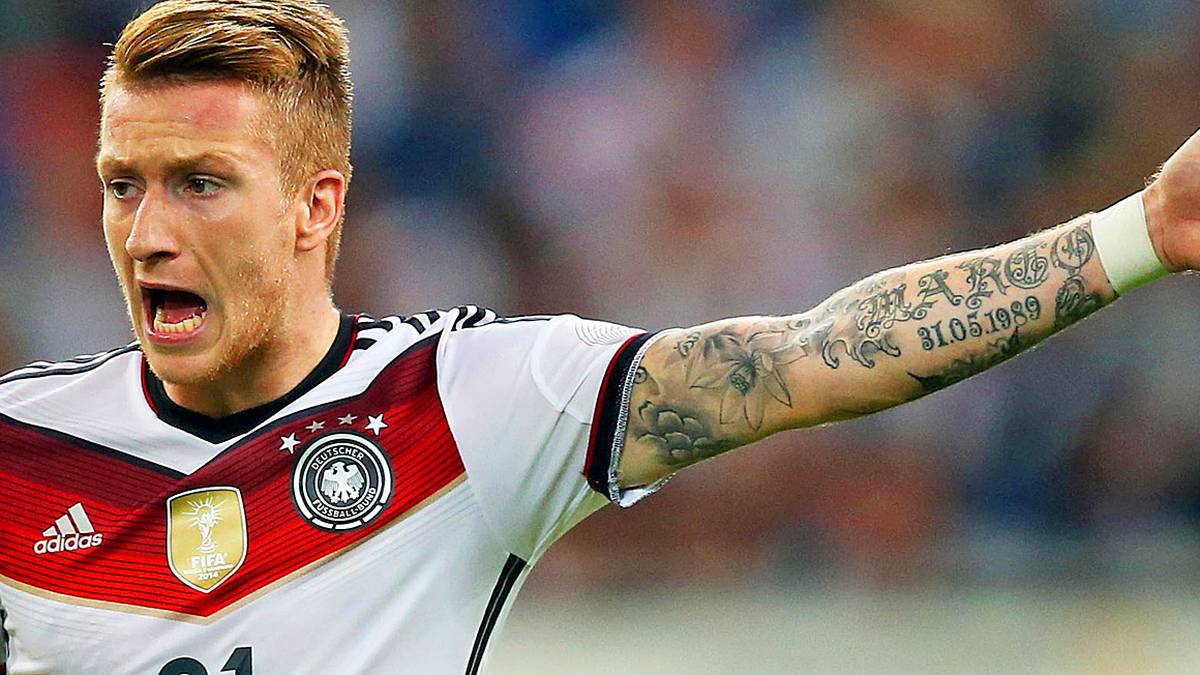 Marco Reus lion and forearm tattoos in Germany kit