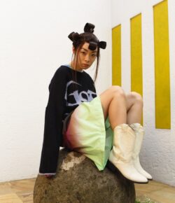 Rina Sawayama Tattoos: Cowboy, Dog, Stegosaurus and More