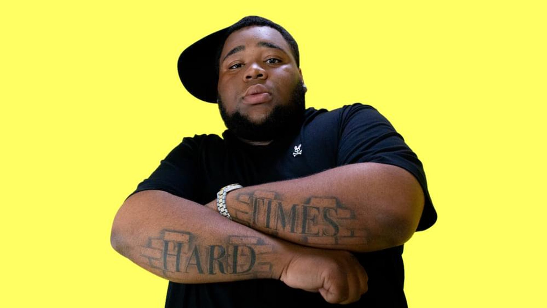 Rod Wave tattoos: the yellow-background portrait showing both words clearly
