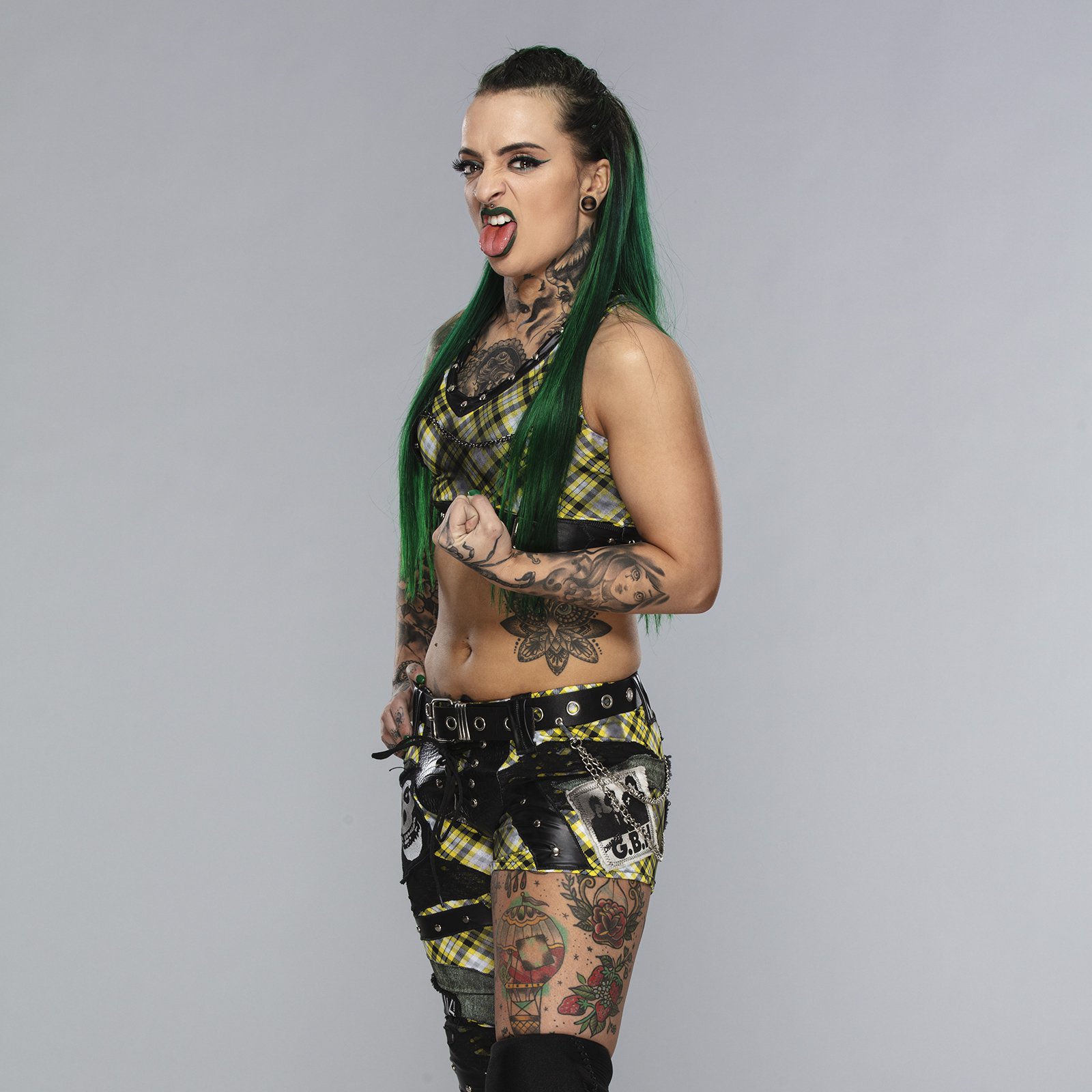 Ruby Soho tattoos: left-thigh balloon and separate floral designs