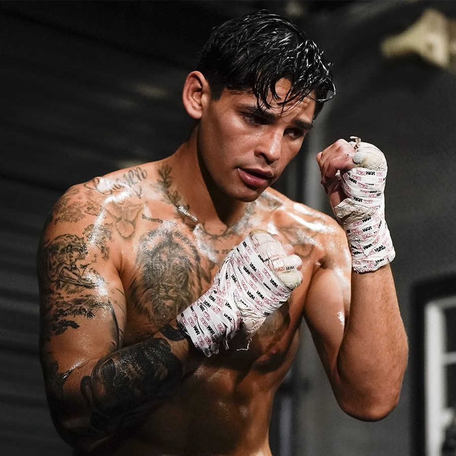 Ryan Garcia tattoos: upper arm sleeve and wet-fight chest view