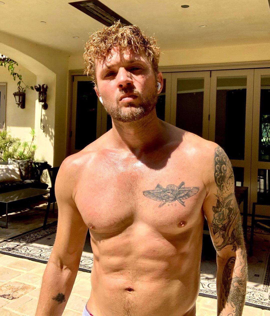 Ryan Phillippe tattoos: A face-visible quarantine portrait that shows the shoulder, chest edge, and arm sleeve in a different pose