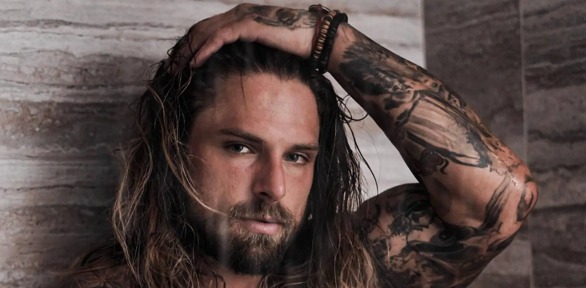 Ryan Stacks tattoos: inline tattoo photograph showing the face, chest and tattooed right arm