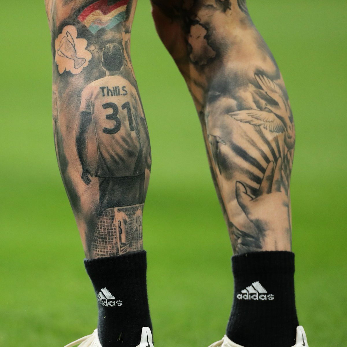Sébastien Thill Genuine tattoo close-up showing the dream tattoo and surrounding calf ink. Sébastien Thill tattoos: Genuine tattoo close-up showing the dream tattoo and surrounding calf ink.