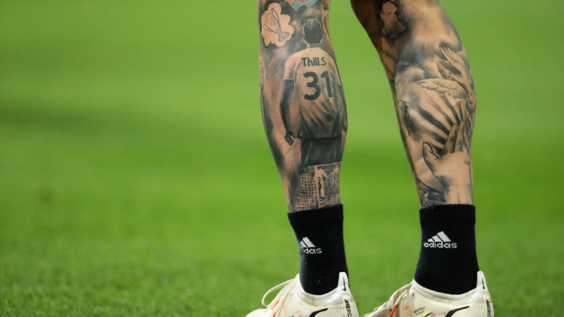 Sébastien Thill Separate published calf-tattoo image used for the documented dream-design context; the copy avoids treating it as a second design. Sébastien Thill tattoos: Separate published calf-tattoo image used for the documented dream-design context; the copy avoids treating it as a second design.