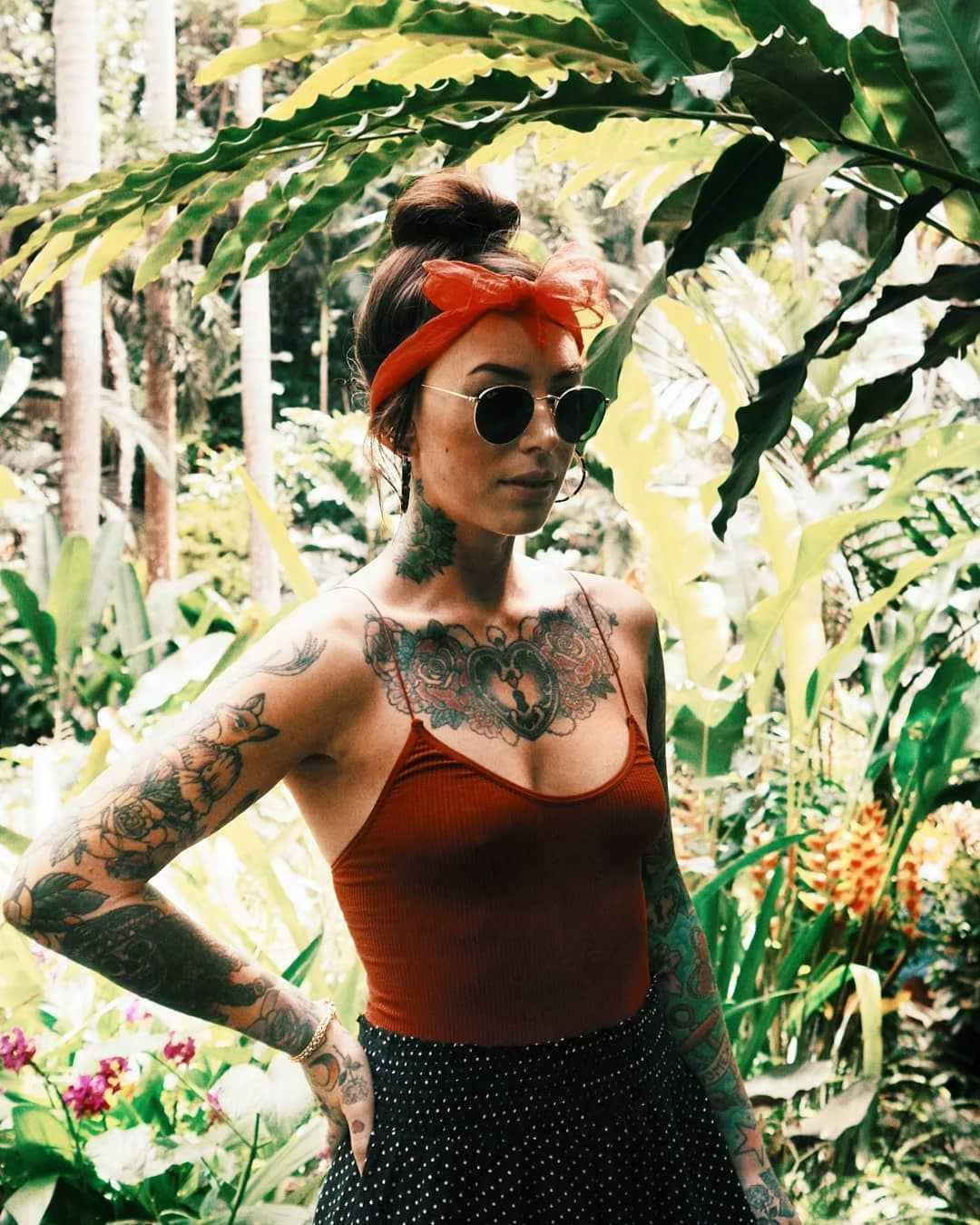 Sammi Jefcoate tattoos: The heart-shaped lock and roses on her chest