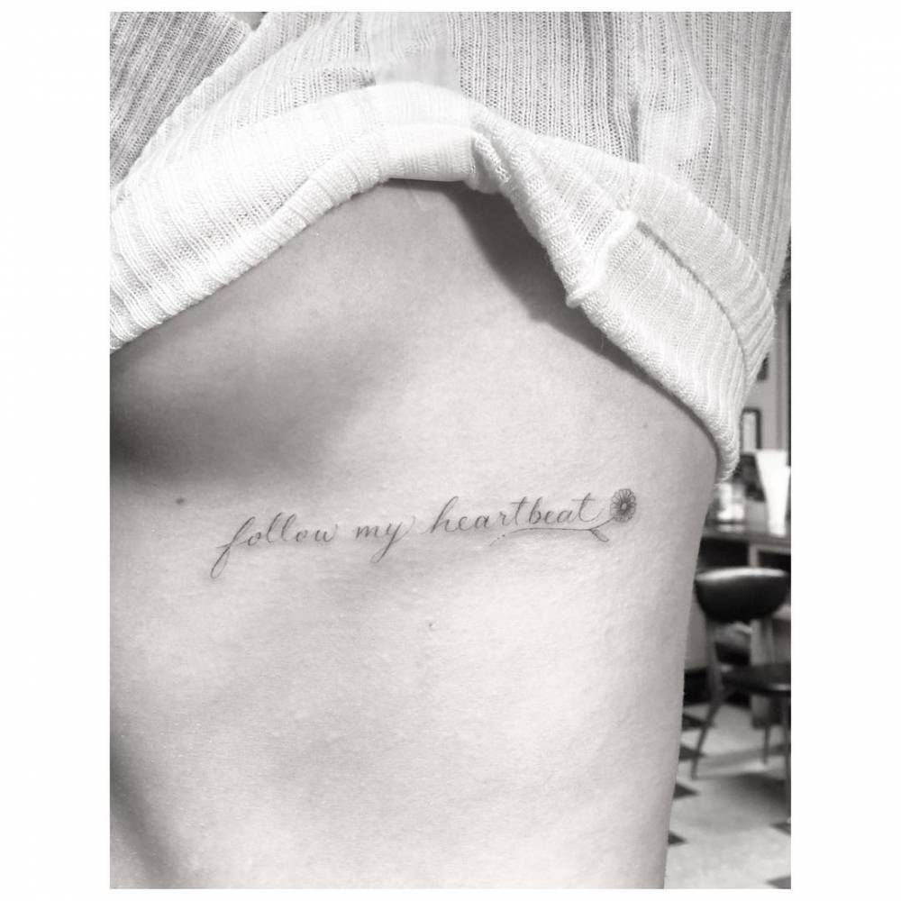 Sarah Hyland tattoos: The “Follow my heartbeat” rib tattoo