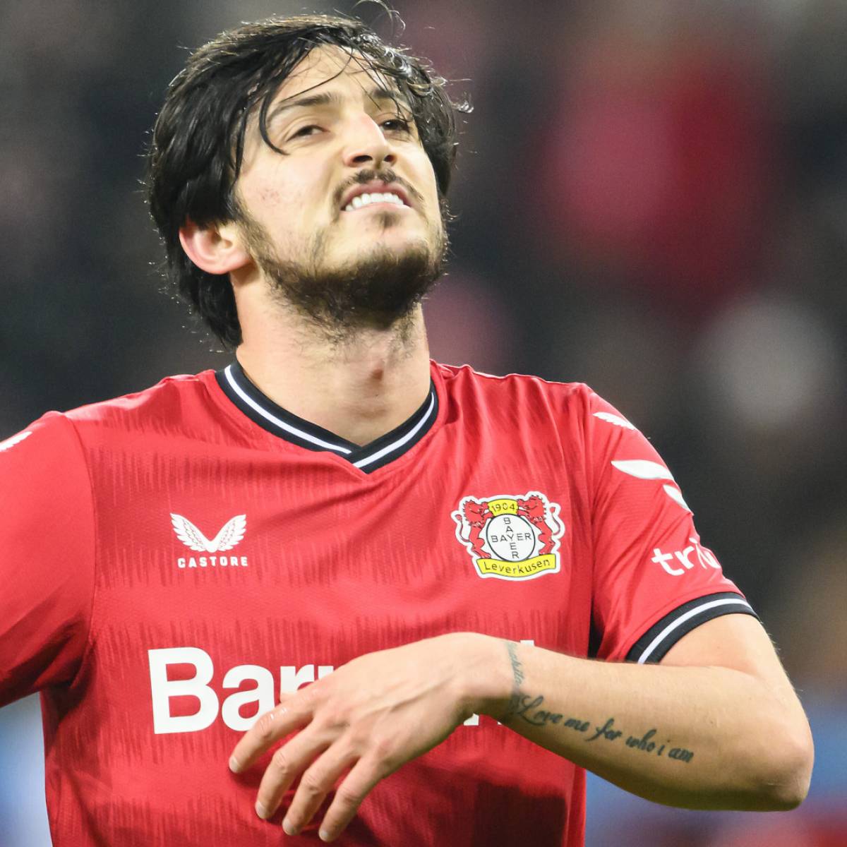 Sardar Azmoun tattoos: forearm lettering in Bayer Leverkusen photograph