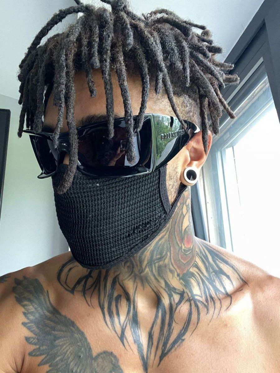 Scarlxrd tattoos: high-resolution close portrait showing the eagle neck tattoo and layered chest ink
