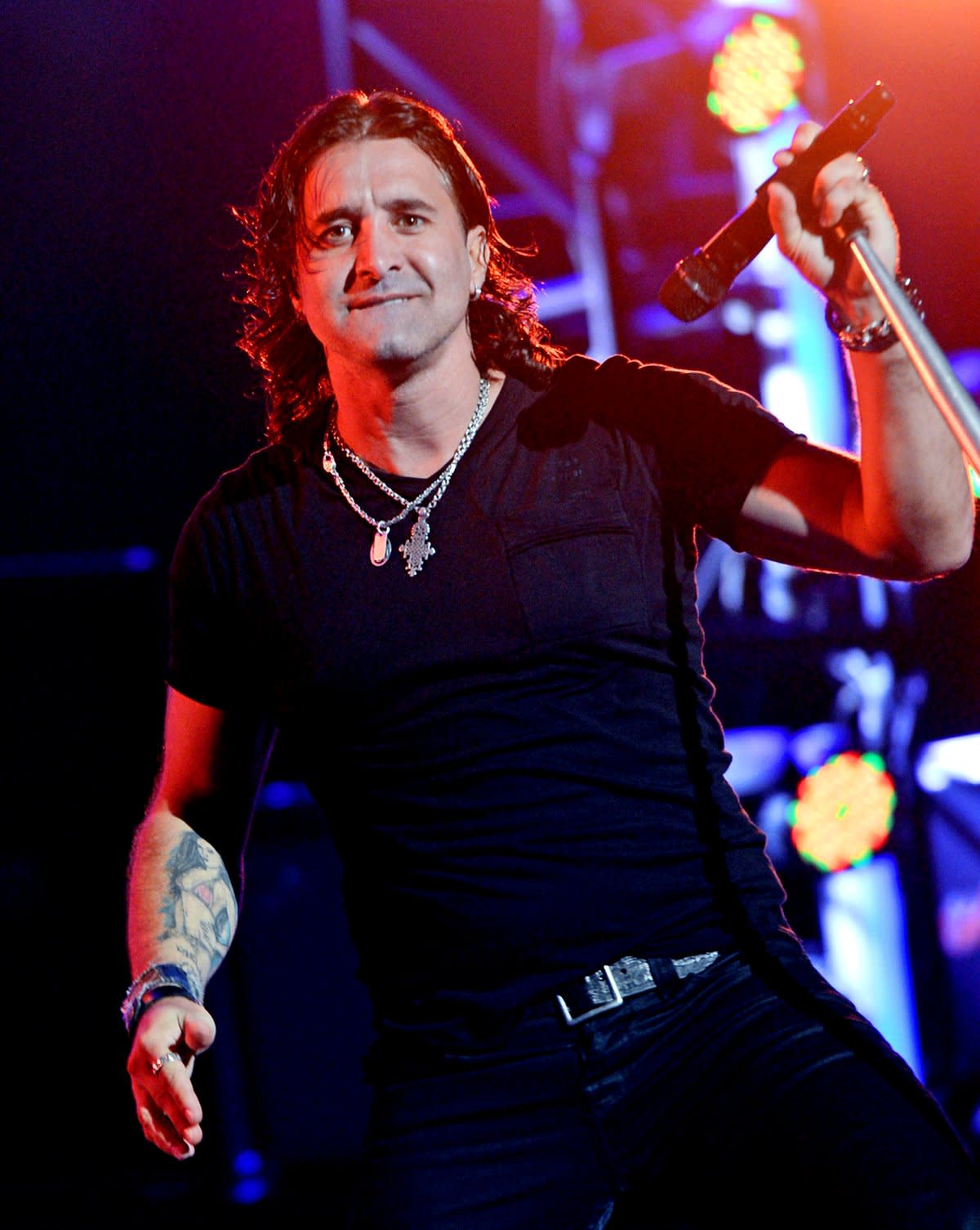 Scott Stapp red and blue forearm tattoo