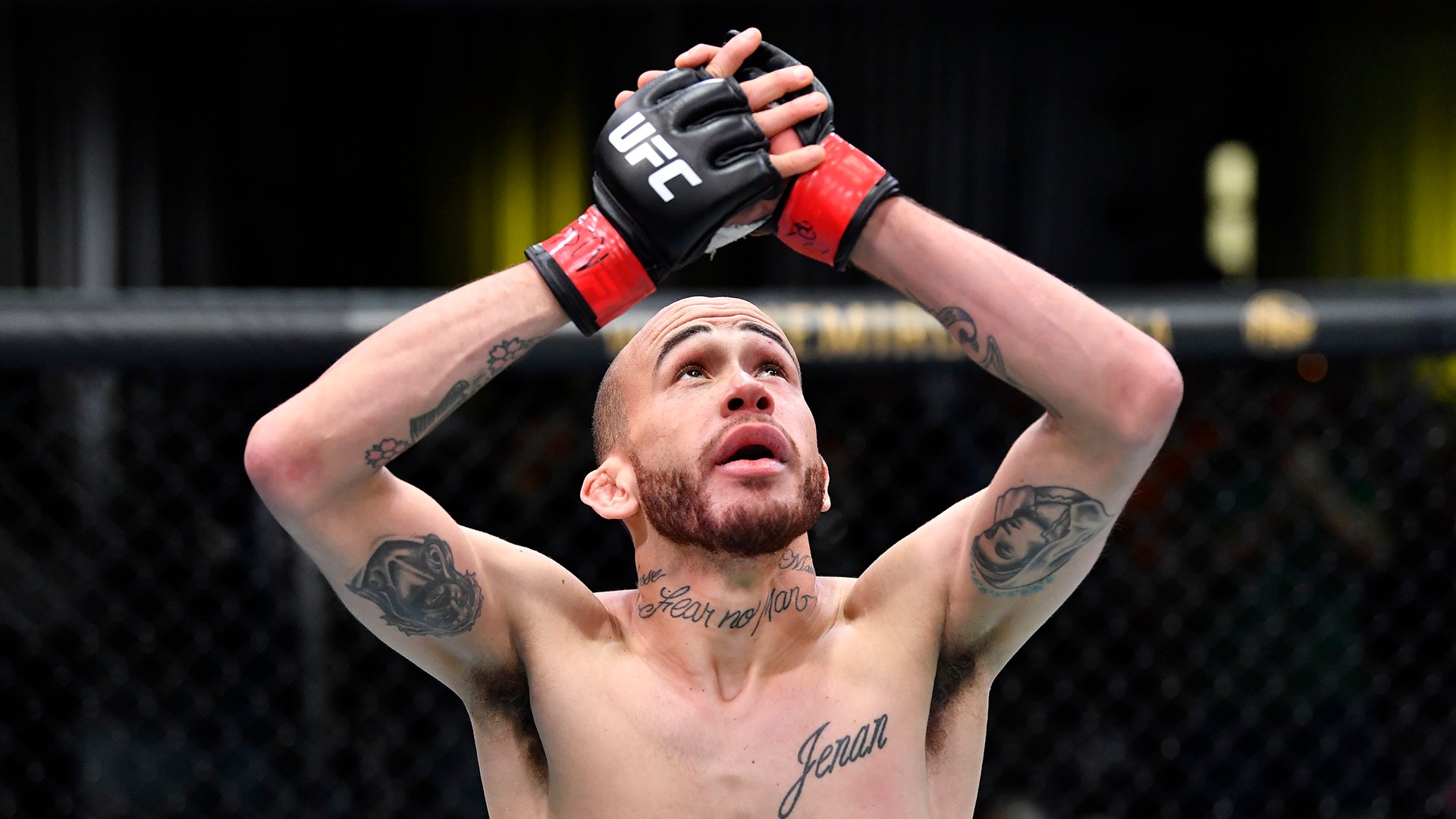 Sean Woodson tattoos: The neck script and upper-arm tattoos