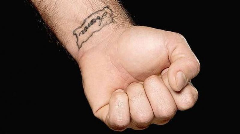 Seth Rollins forever wrist tattoo in clear close view